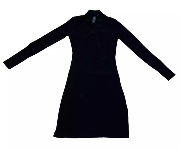 Dress by Norma Kamali