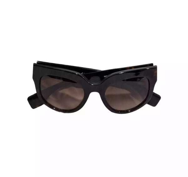 Sunglasses by Prada