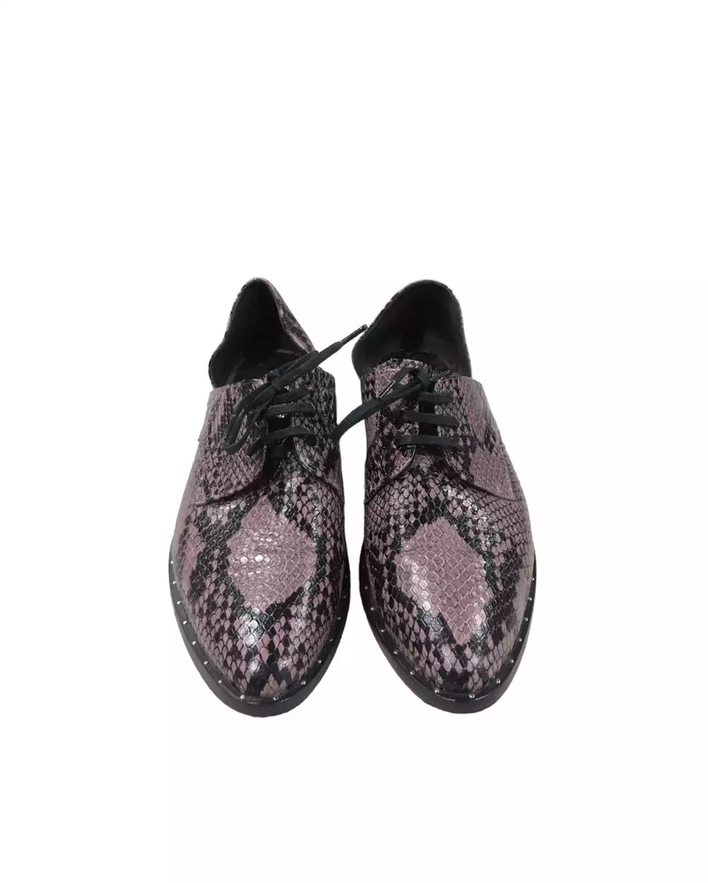 Shoes by Freda Salvador