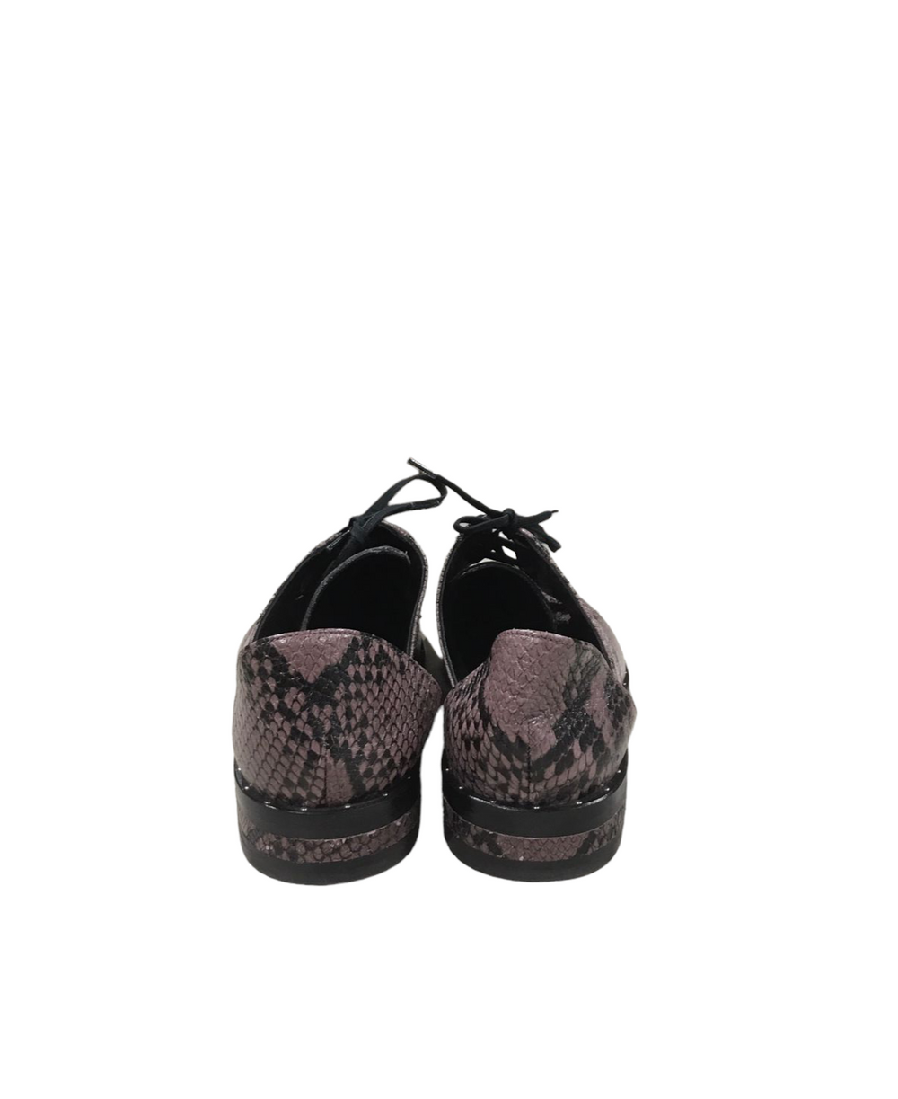 Shoes by Freda Salvador