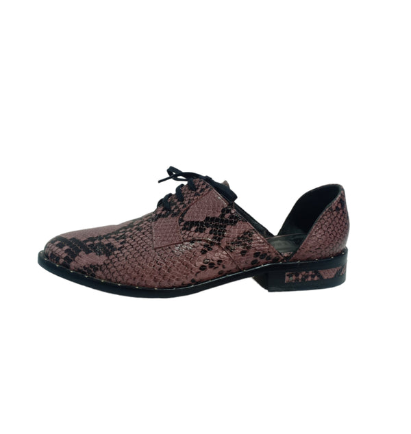 Shoes by Freda Salvador