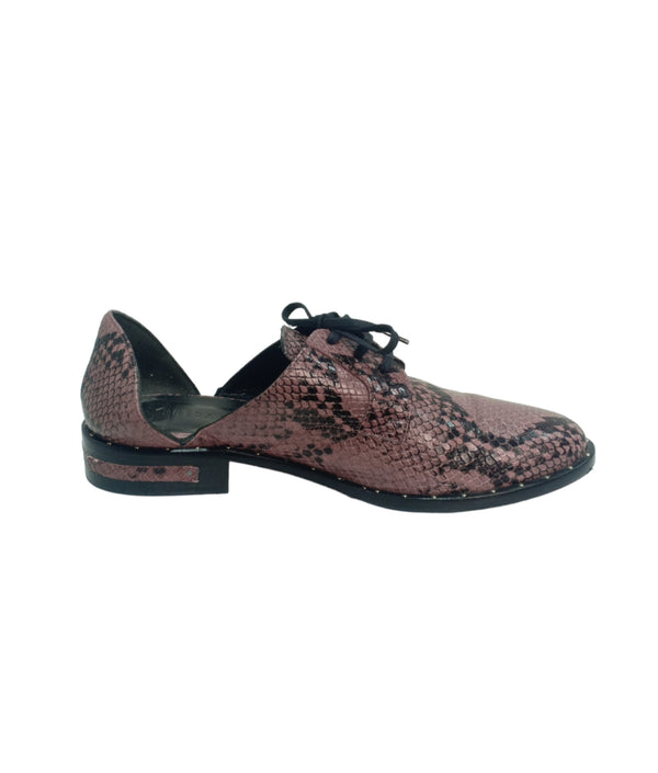 Shoes by Freda Salvador